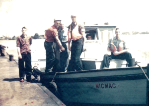 Historic workboat on the Seaway with Evans McKeil and workers." title="The MicMac was the first vessel in the McKeil fleet.